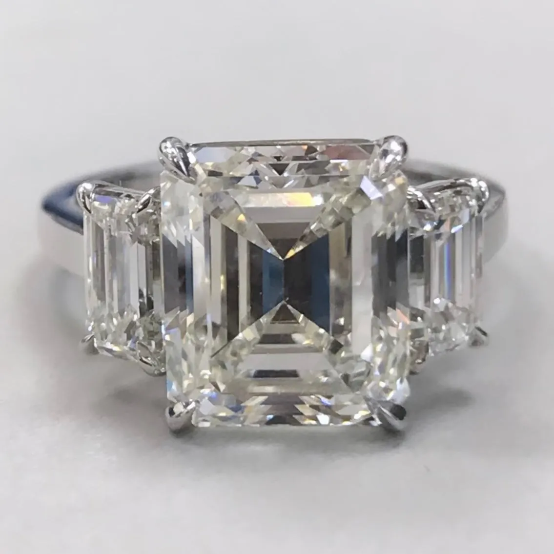 Beauvince Ariel 3 Stone Ring (5.82 ct Emerald Cut IVVS2 IGI Diamond) in Platinum