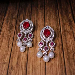 Earrings in Chetum and Pearls