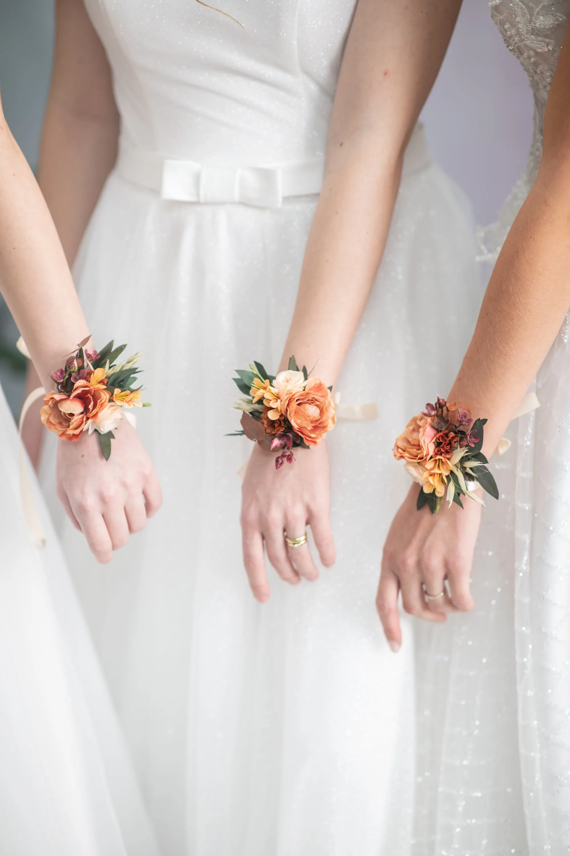 Orange bracelets for bride/bridesmaids